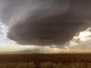 A mesoscyclone west of Lubbock cranks up and blows dust around