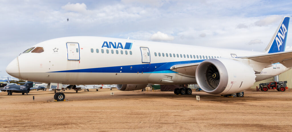 N787EX ANA Boeing 787 Dreamliner with some A-10s flying in the background